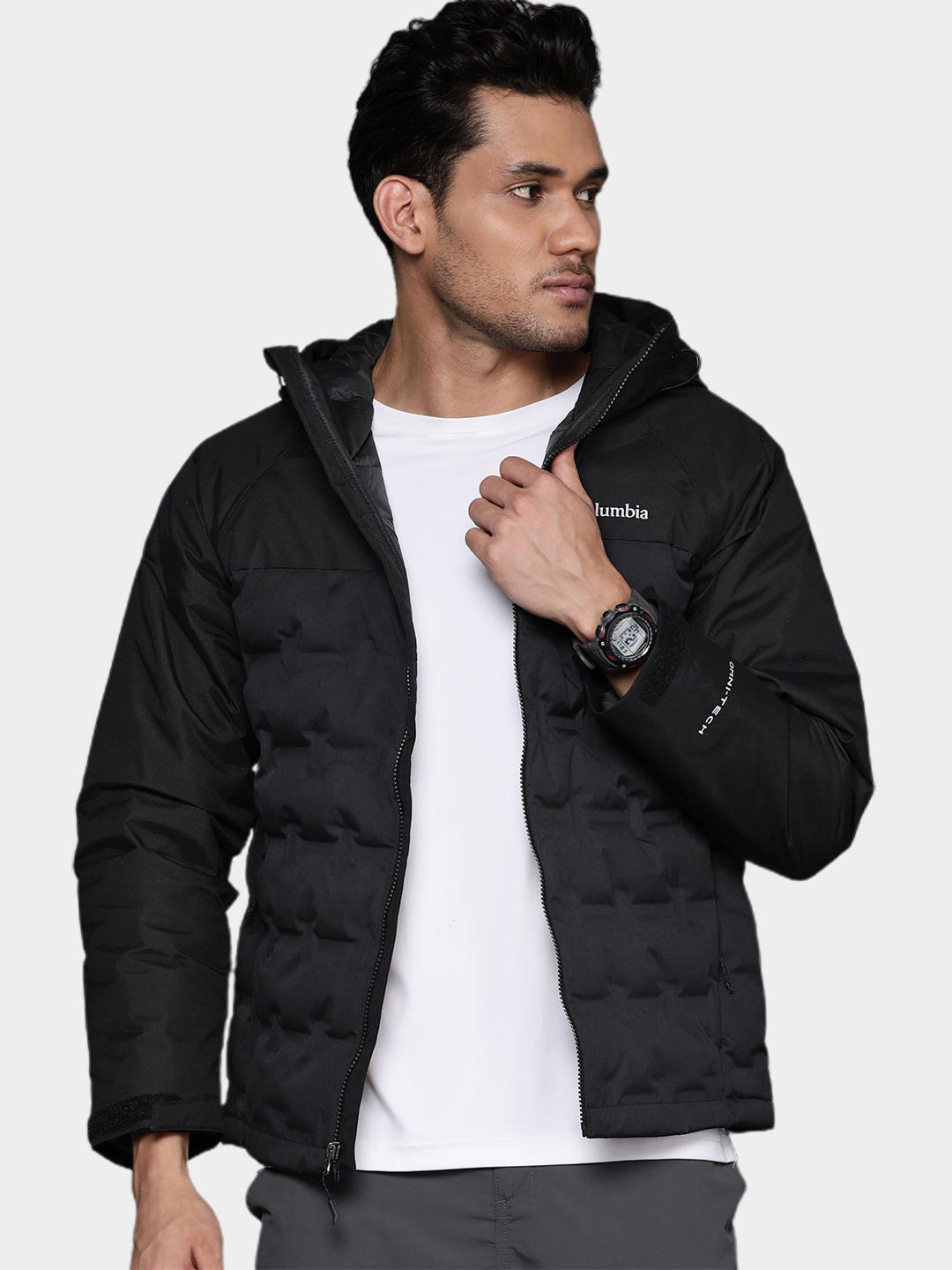 A Men Wearing Columbia Men Black Grand Trek II Down Hooded Jacket