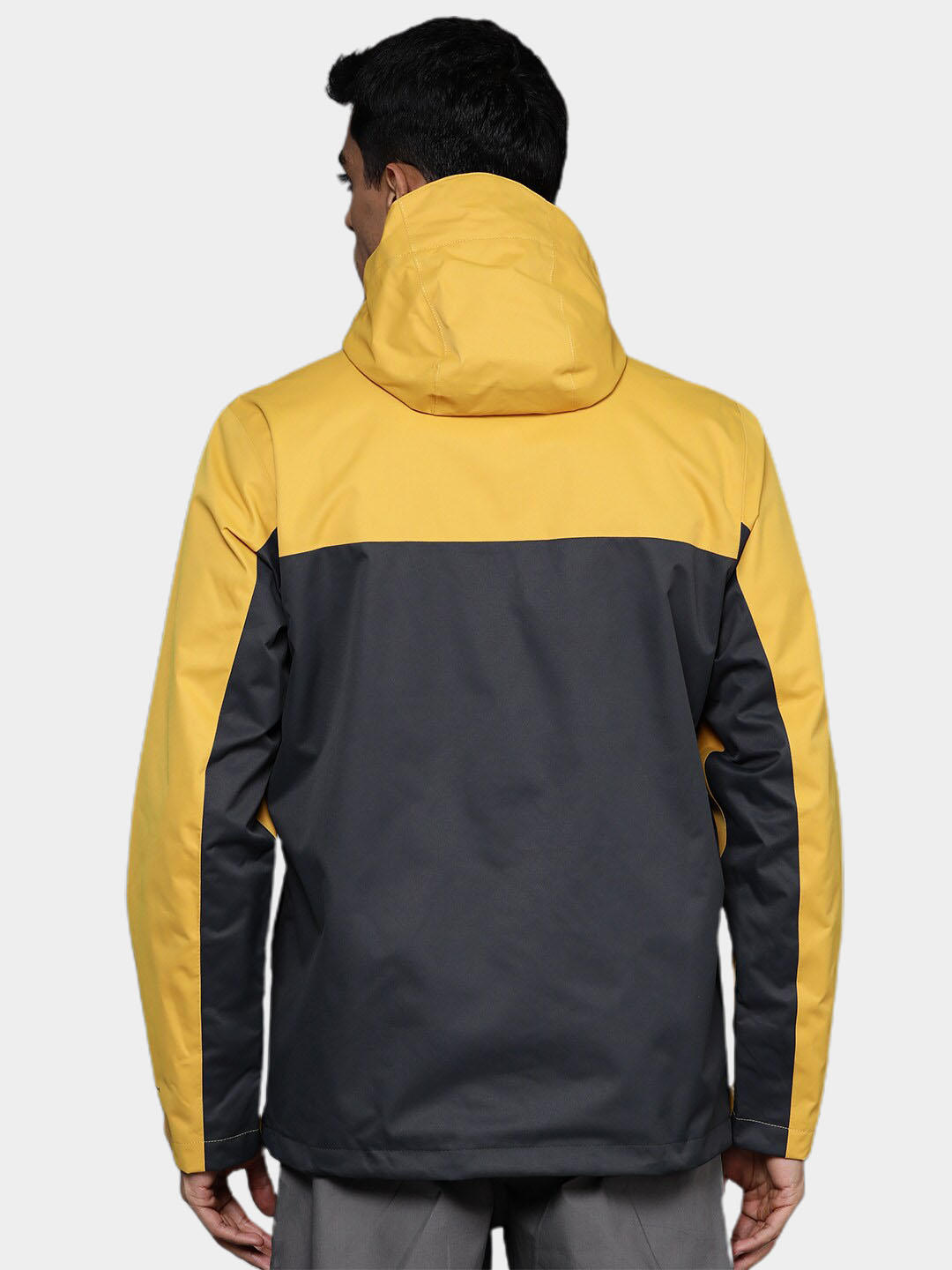 A Men Wearing Columbia Men Yellow Hikebound Jacket Waterproof