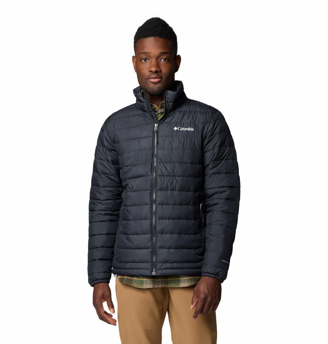 A man wearing a black Columbia Men's Black Omni-Heat Reflective Powder Lite II Jacket with a logo on the chest, standing against a white background.