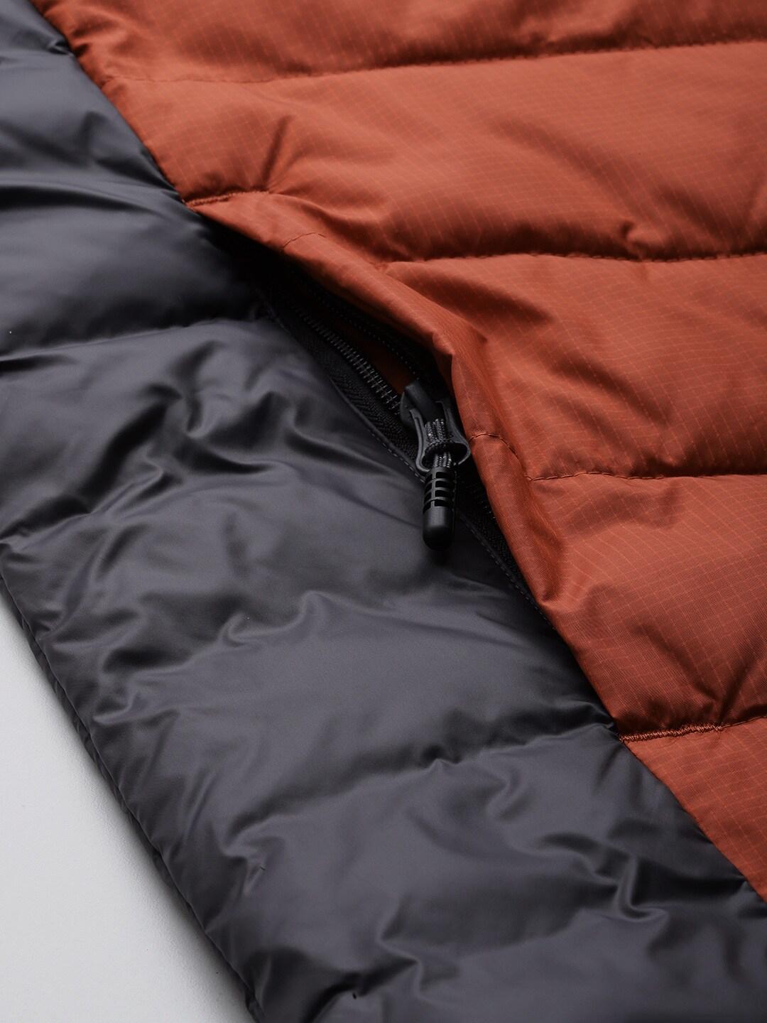 A Men Wearing Columbia Men Orange Labyrinth Loop Jacket