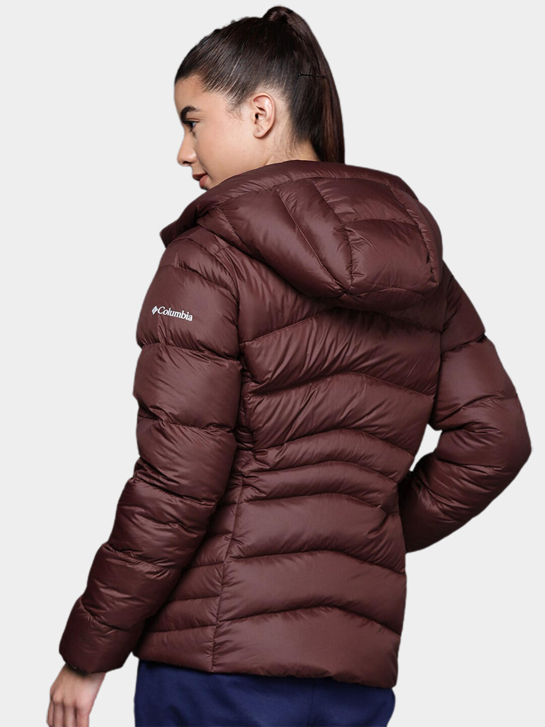 A Women Wearing Columbia Women Maroon Autumn Park Down Hooded Jacket