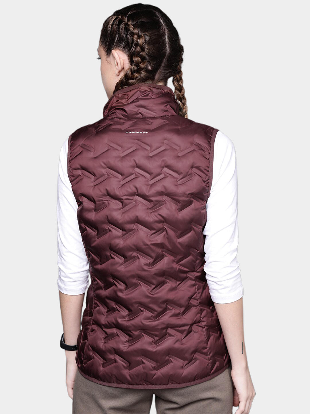 A Women Wearing Columbia Women Maroon Delta Ridge Down Vest