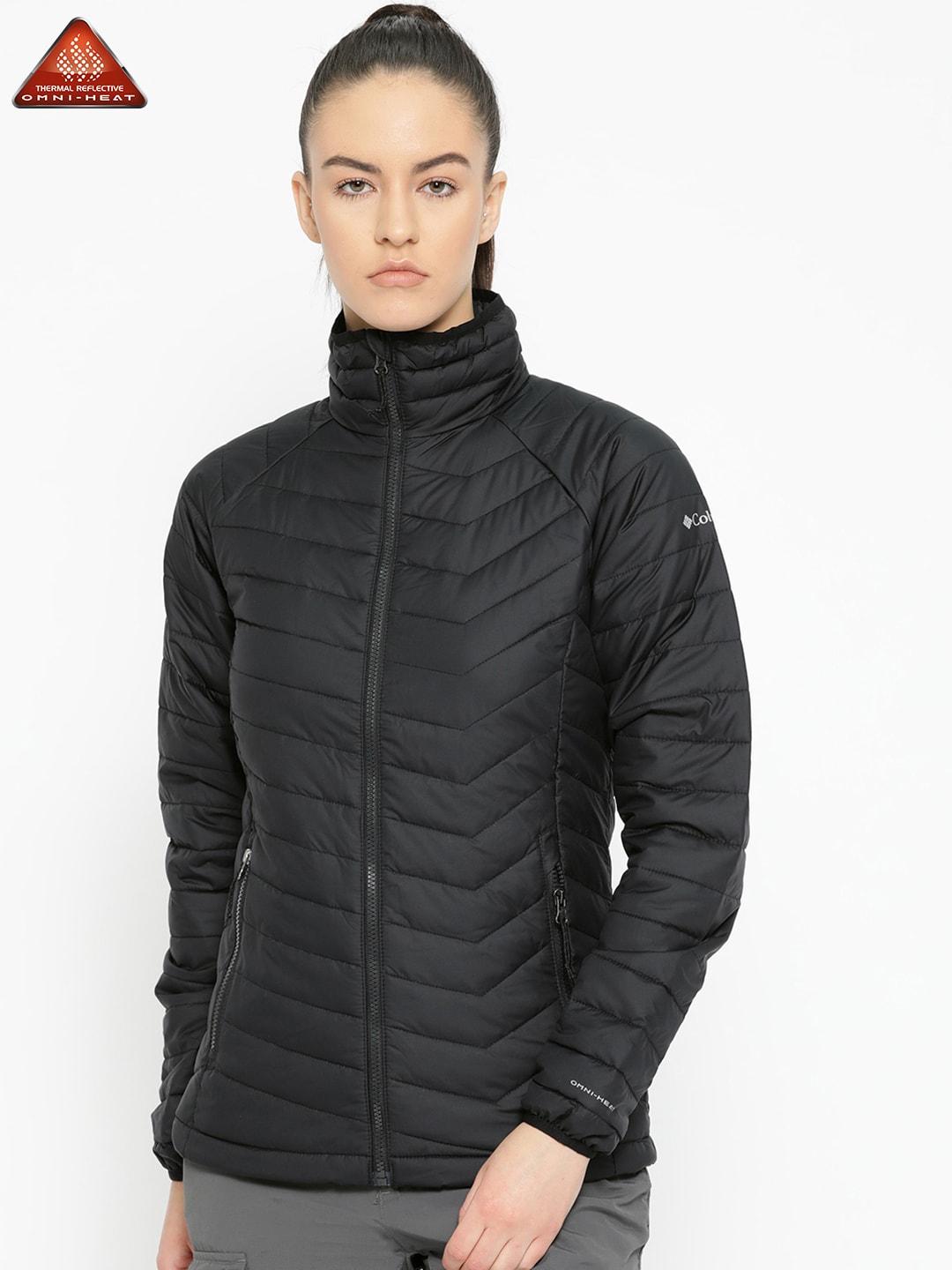 A Women Wearing Columbia Women Black Powder Lite Jacket