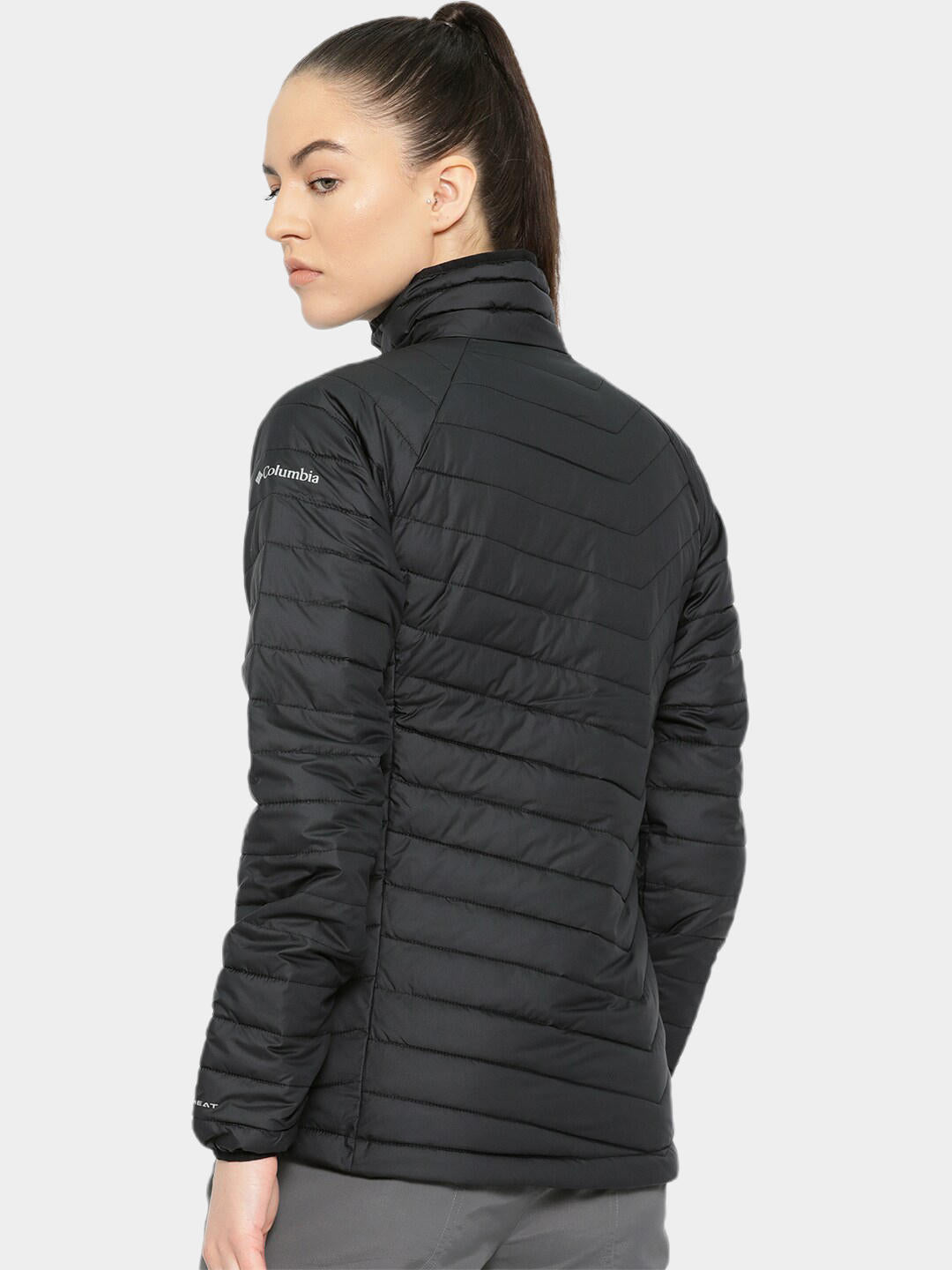 A Women Wearing Columbia Women Black Powder Lite Jacket