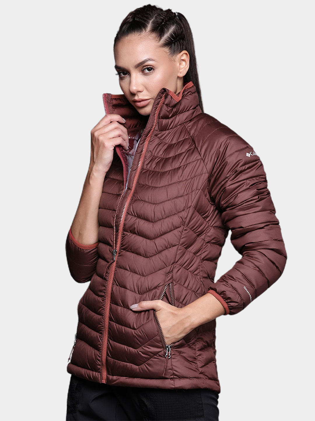 A Women Wearing Columbia Women Maroon Powder Lite Jacket