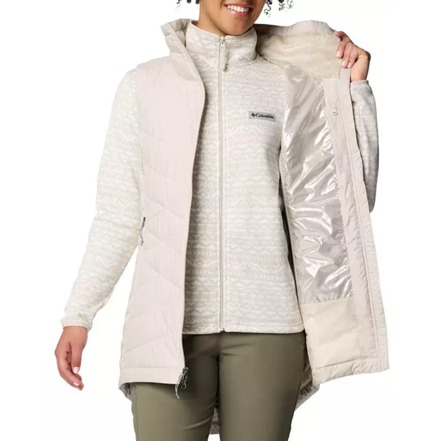 A Women Wearing Columbia Women Brown Joy Peak II Long Vest
