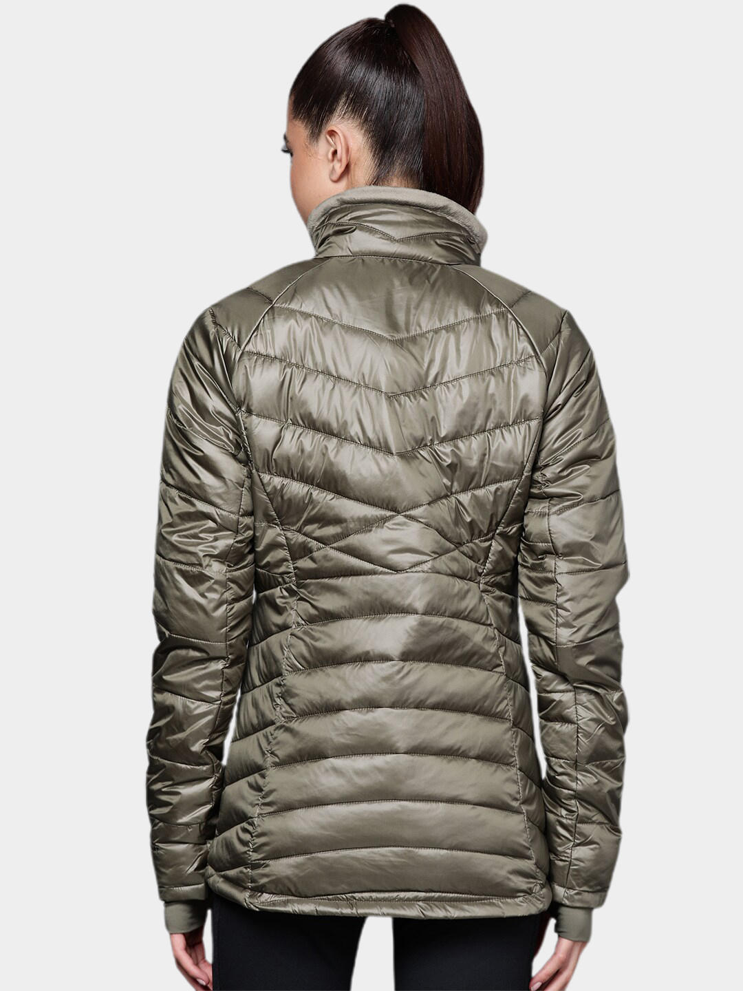 A Women Wearing Columbia Women Green Joy Peak Jacket