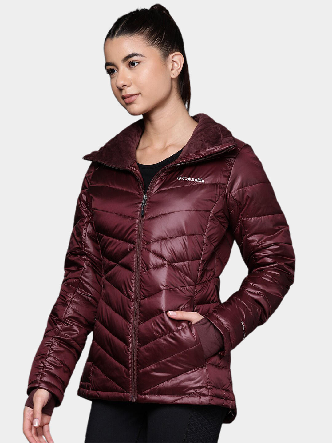 A Women Wearing Columbia Women Maroon Joy Peak Jacket