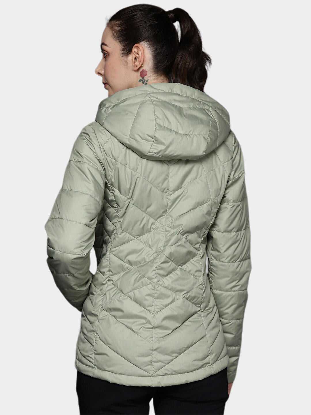 A Women Wearing Columbia Women Green Heavenly Hooded Jacket