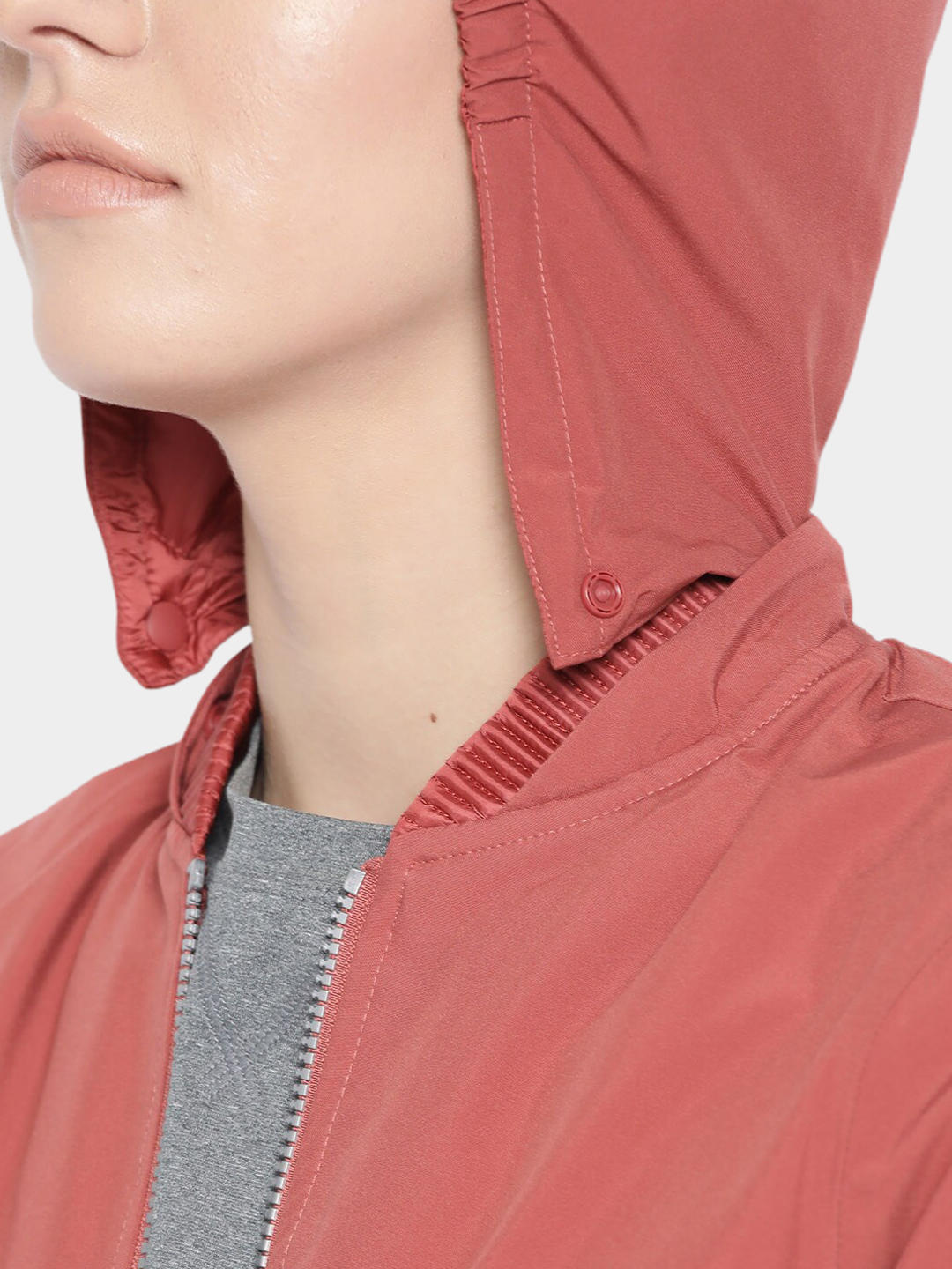 A Women Wearing Columbia Women Red Hillsdale Spring Reversible Jacket