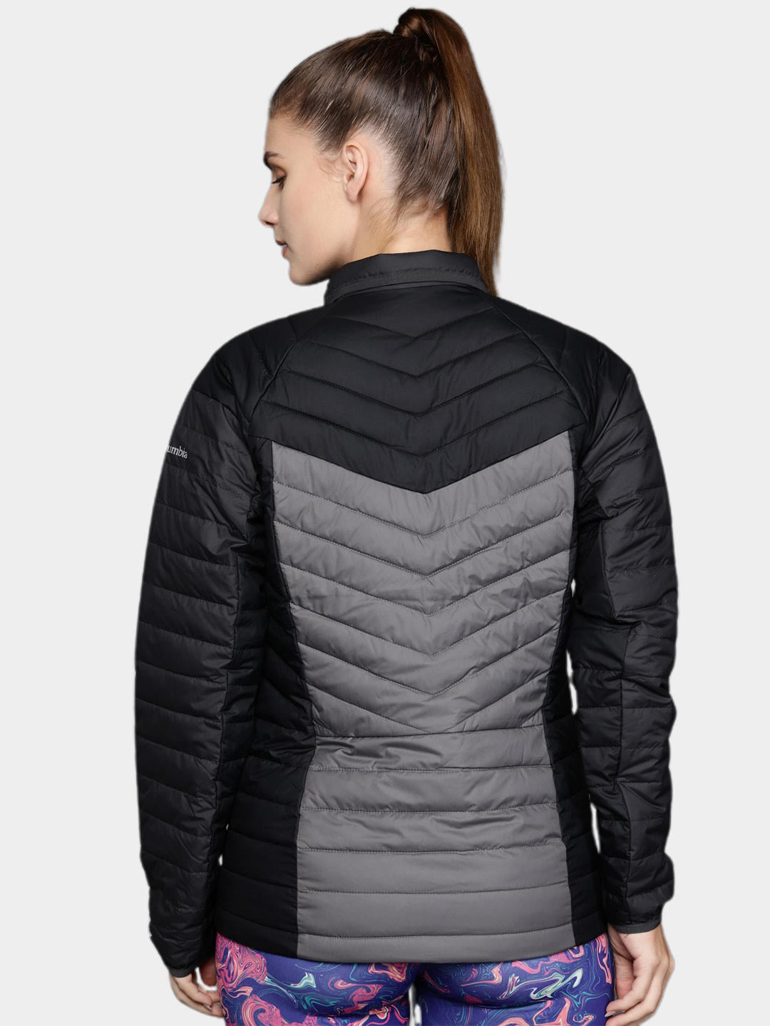 A Women Wearing Columbia Women Grey Powder Lite II Full Zip Jacket