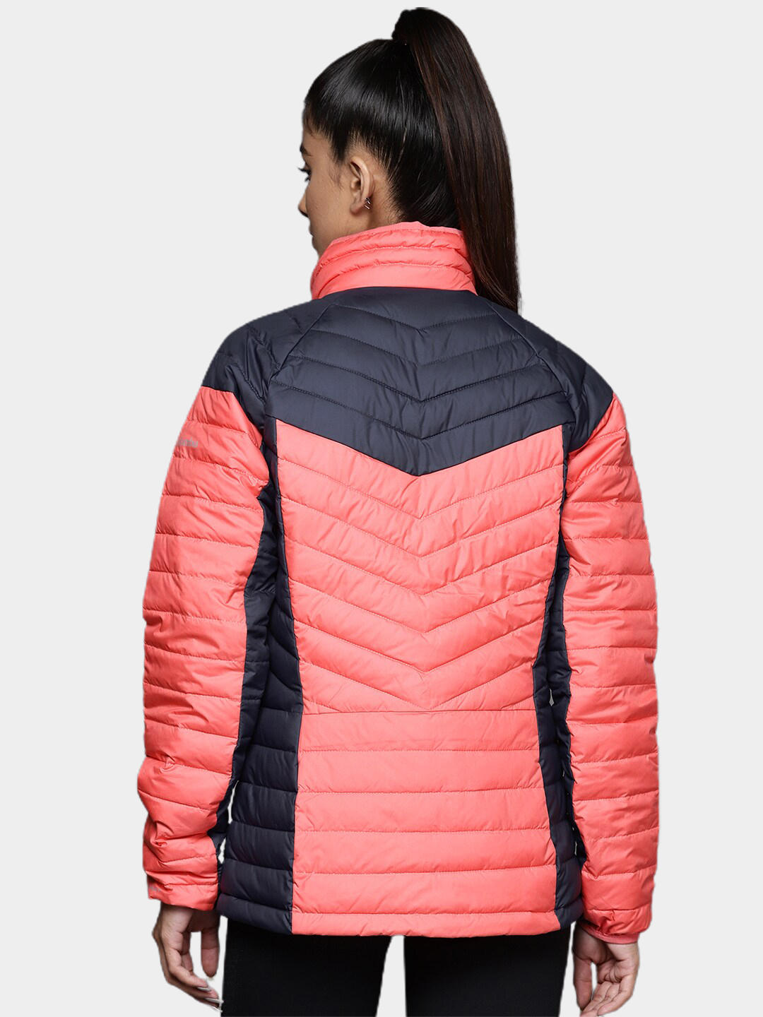 A Women Wearing Columbia Women Pink Powder Lite II Full Zip Jacket