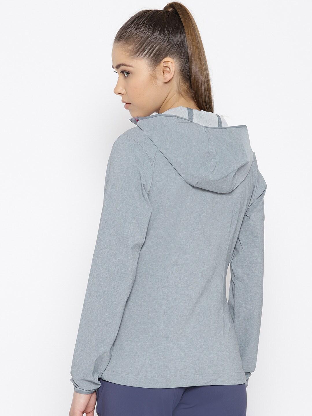A Women Wearing Columbia Women Grey Heather Canyon Softshell Jacket