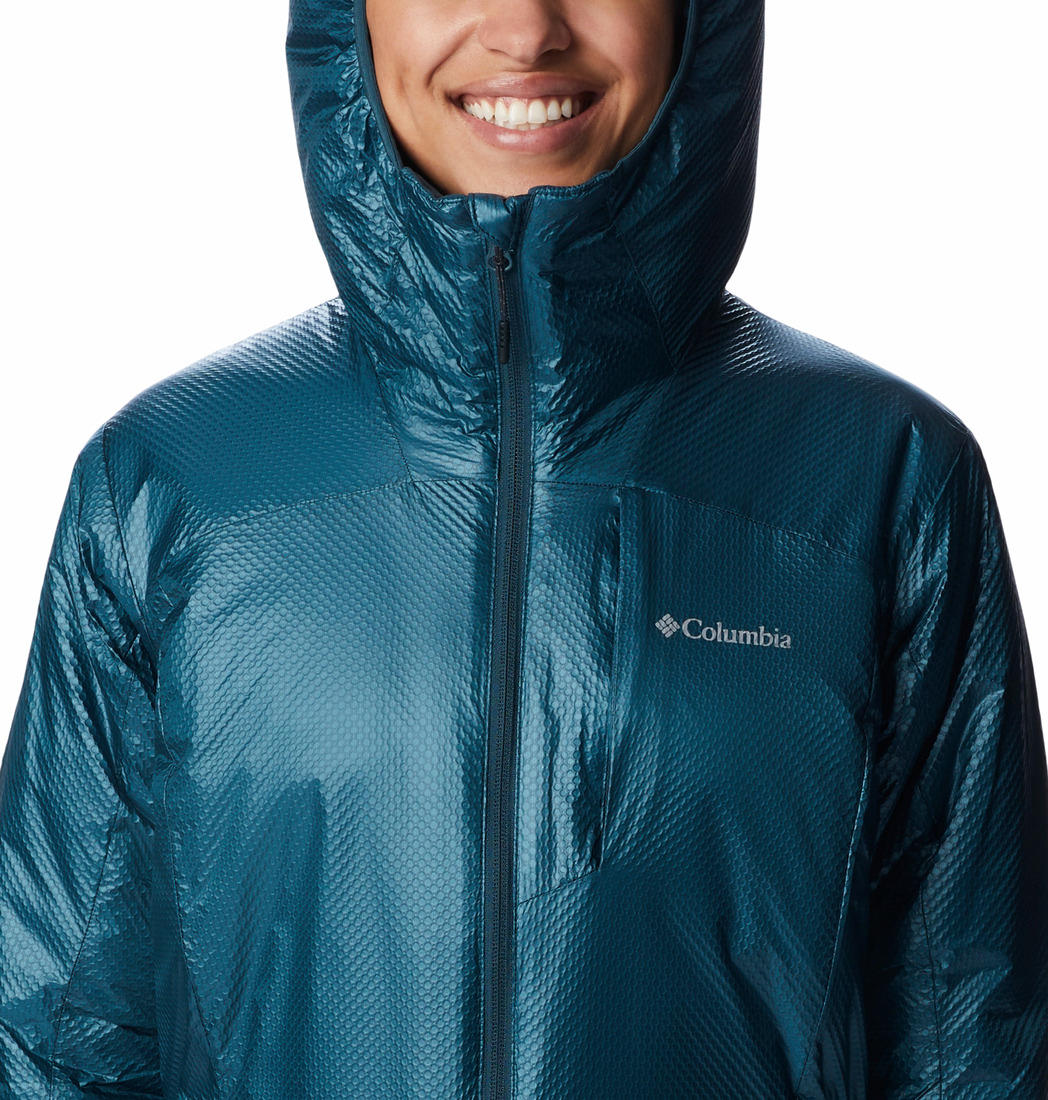 A Women Wearing Columbia Women Blue Arch Rock Double Wall Elite Mid Jacket