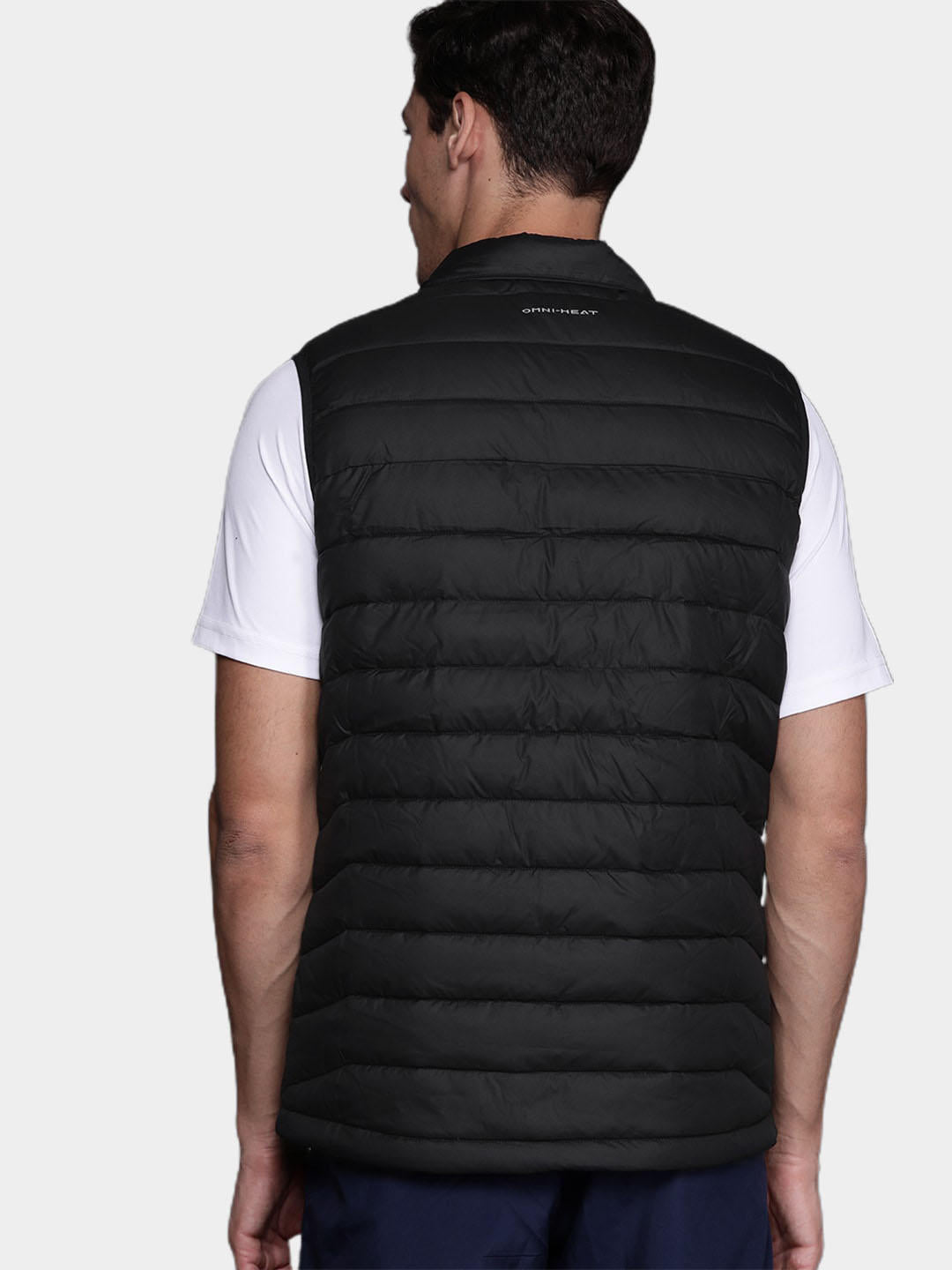 A Men Wearing Columbia Men Black Powder Lite Vest