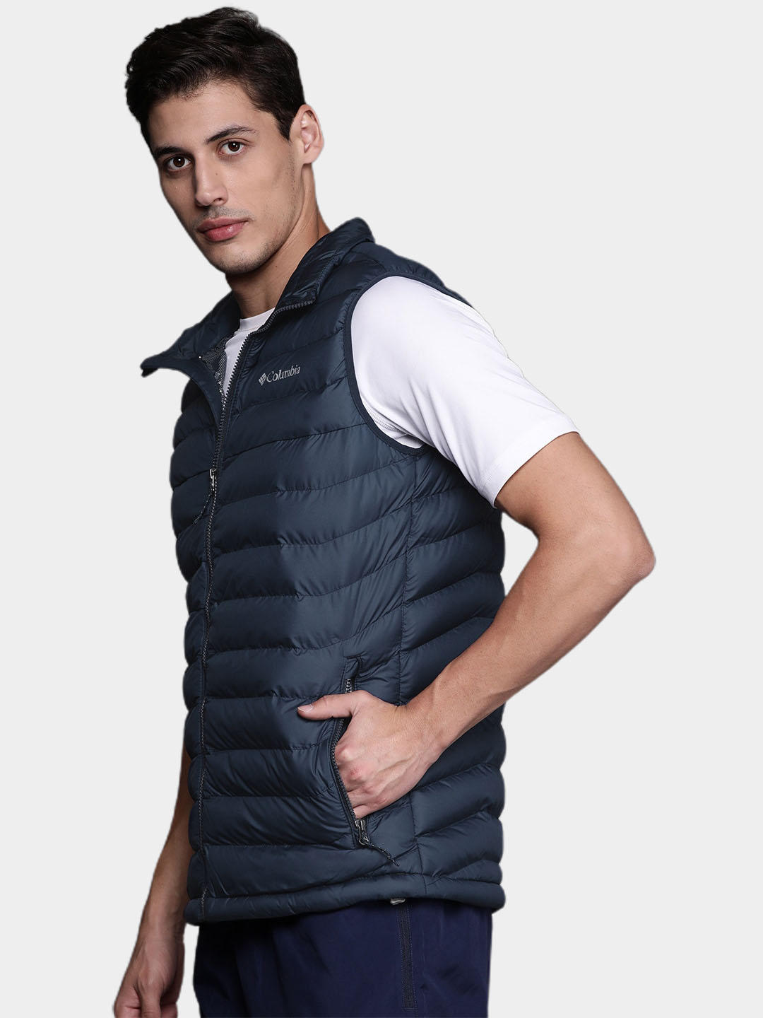 A Men Wearing Columbia Men Blue Powder Lite Vest