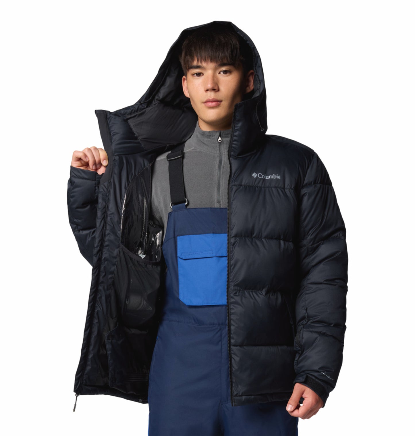 A Men Wearing Columbia Men Black Slope Style Jacket