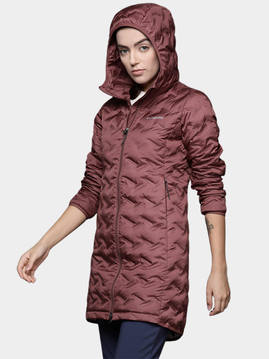 A Women Wearing Columbia Women Pink Delta Ridge Long Down Jacket