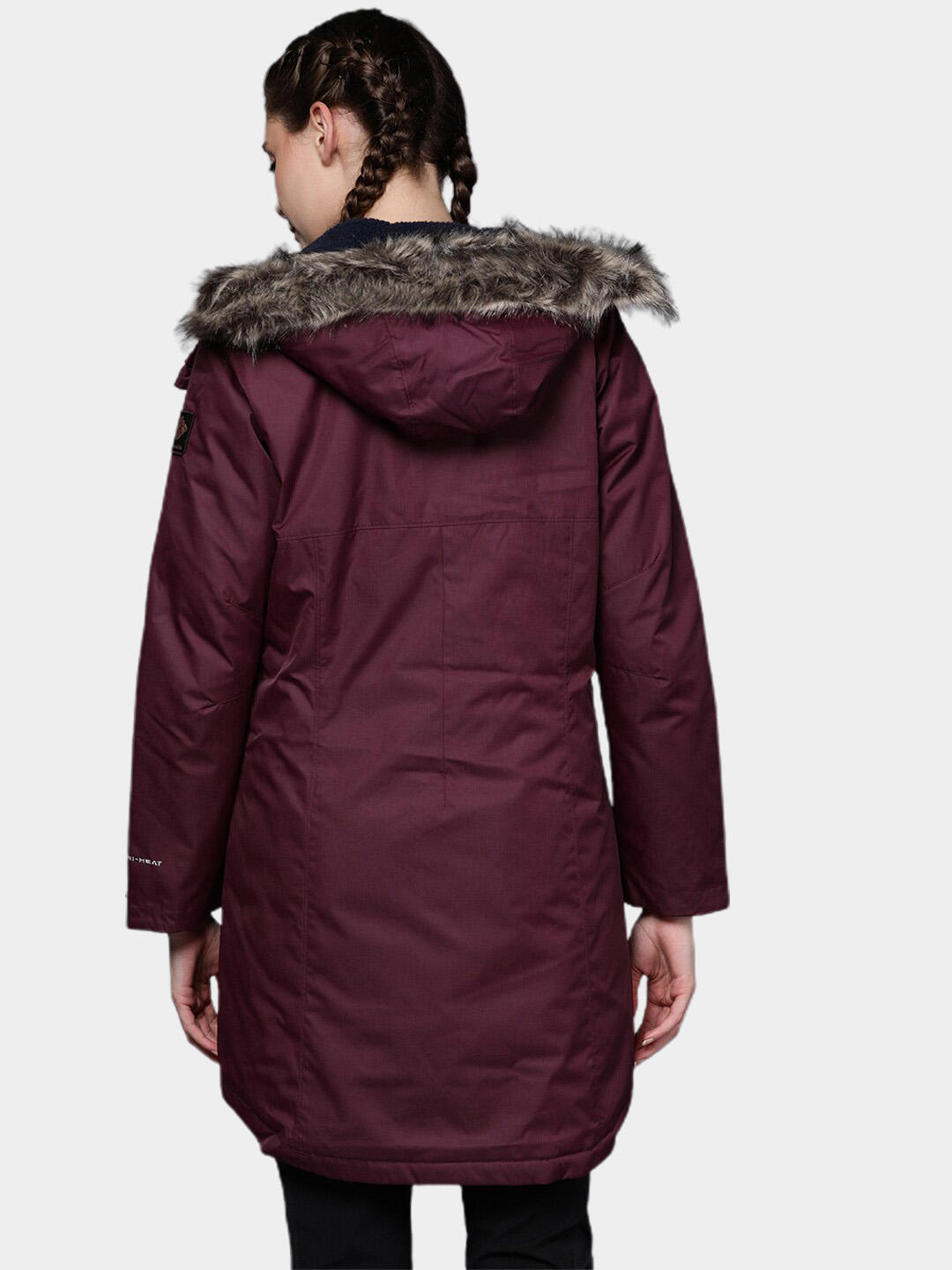 A Women Wearing Columbia Women Purple Suttle Mountain Long Insulated Jacket