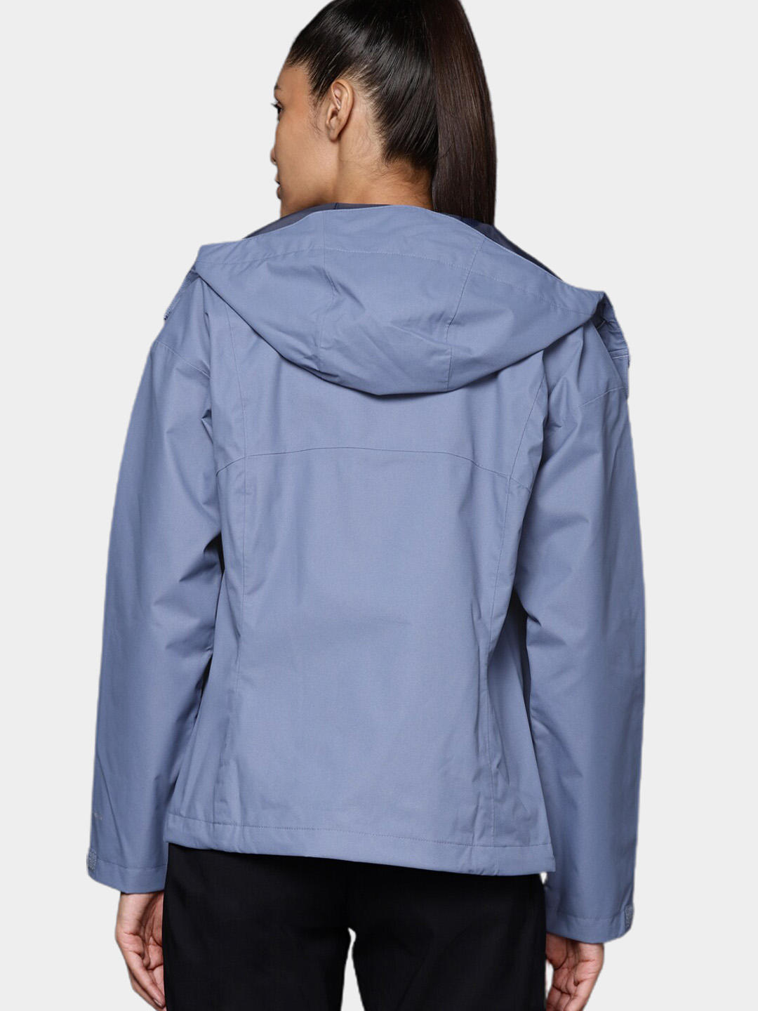 A Women Wearing Columbia Women Blue Hikebound Jacket Waterproof