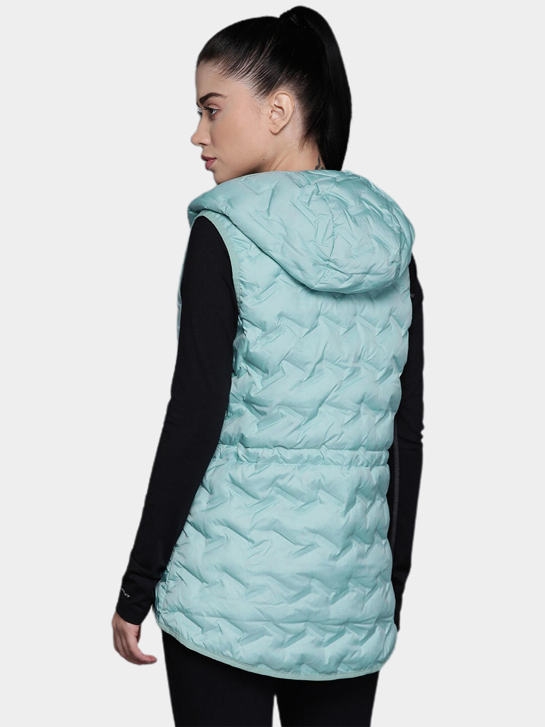 A Women Wearing Columbia Women Blue Delta Ridge Hooded Vest