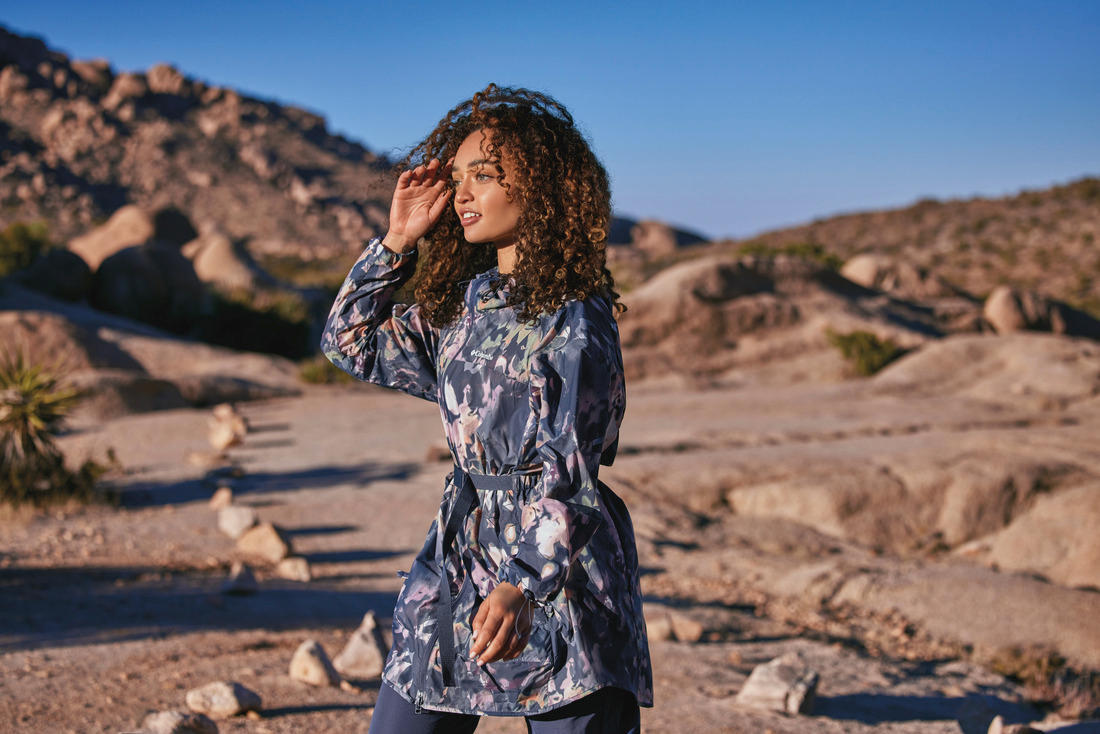 A Women Wearing Columbia Women Navy Blue Parkette Long Wind Jacket (Sun Protection)