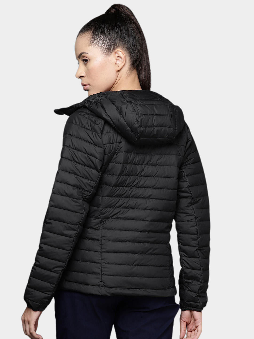A Women Wearing Columbia Women Black Silver Falls Hooded Jacket