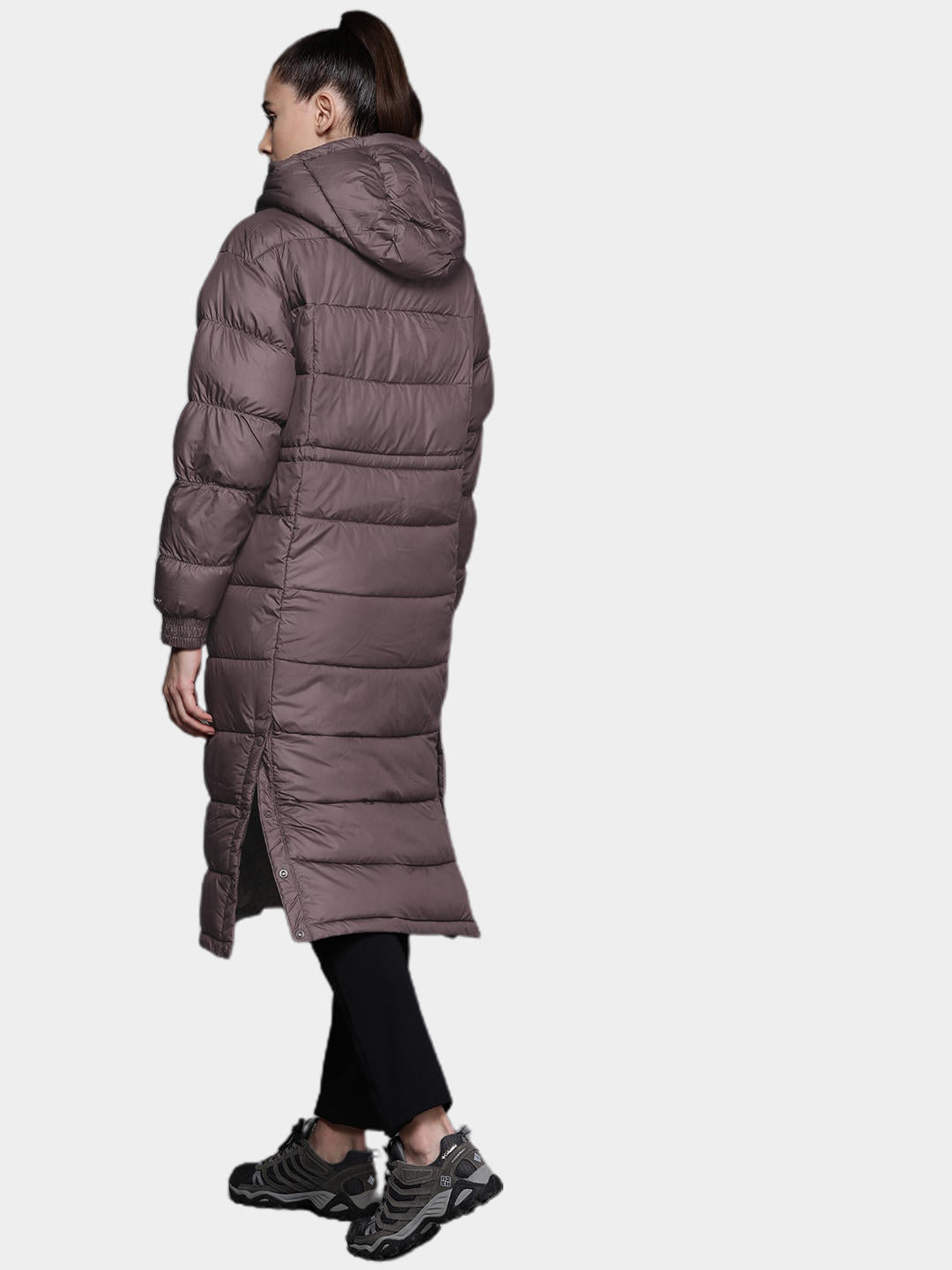 A Women Wearing Columbia Women Brown Pike Lake II Long Jacket