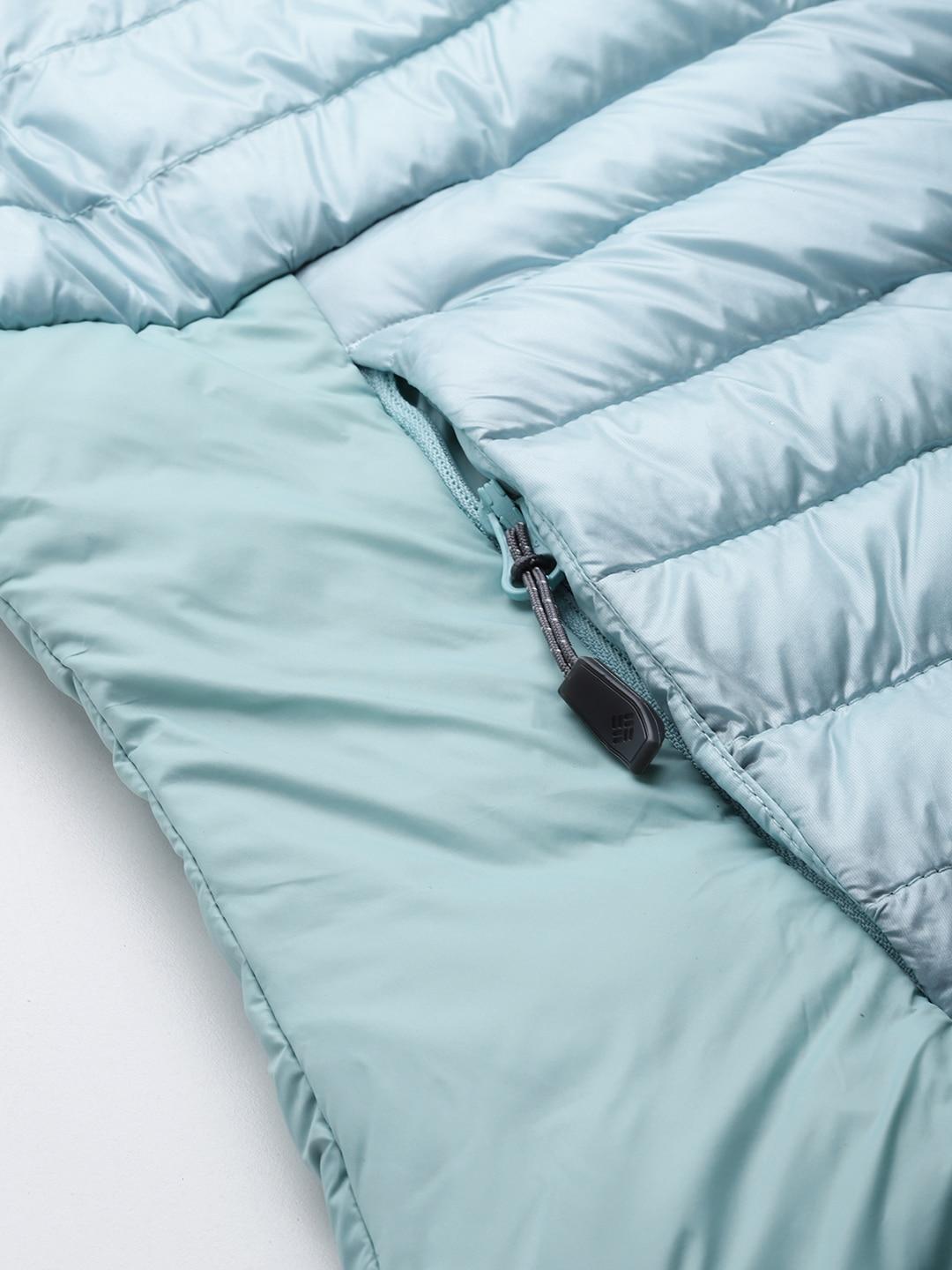 A Women Wearing Columbia Women Blue Labyrinth Loop Hooded Jacket