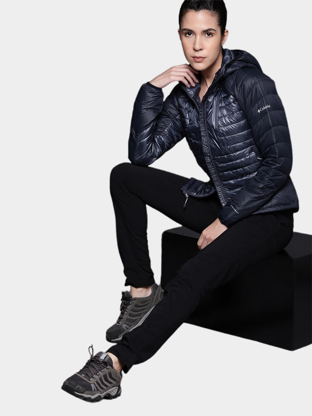 A Women Wearing Columbia Women Navy Blue Labyrinth Loop Hooded Jacket