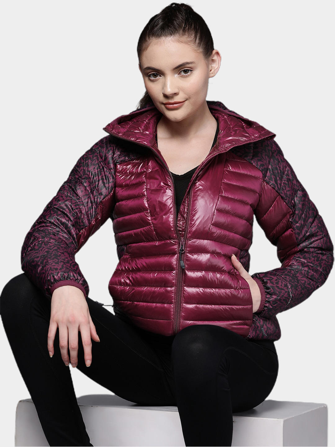 A Women Wearing Columbia Women Purple Labyrinth Loop Hooded Jacket