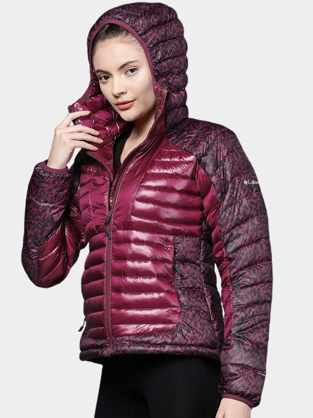 A Women Wearing Columbia Women Purple Labyrinth Loop Hooded Jacket