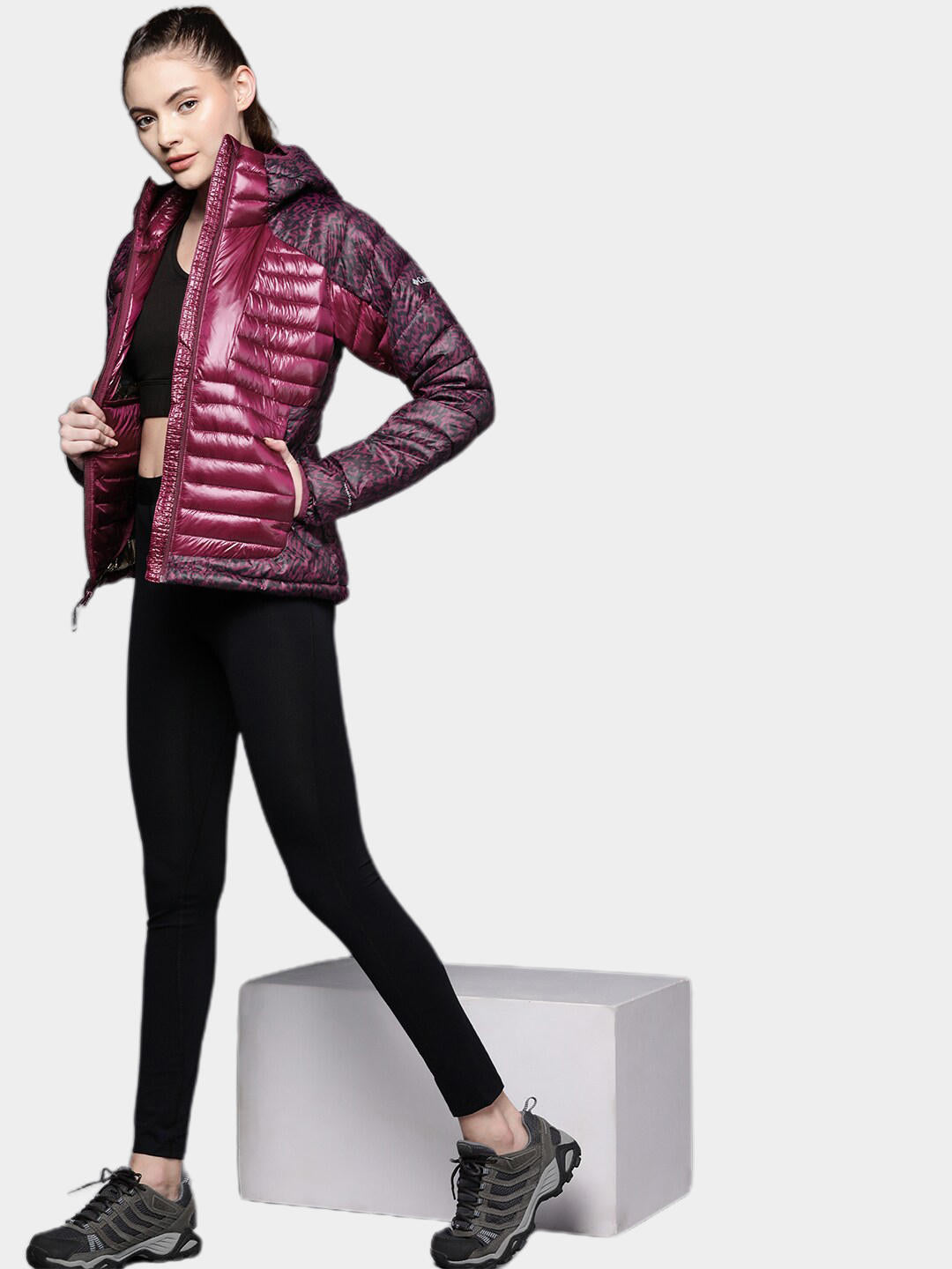 A Women Wearing Columbia Women Purple Labyrinth Loop Hooded Jacket