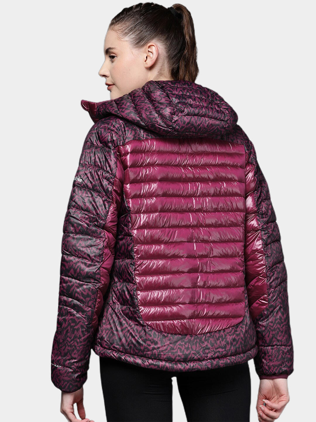 A Women Wearing Columbia Women Purple Labyrinth Loop Hooded Jacket