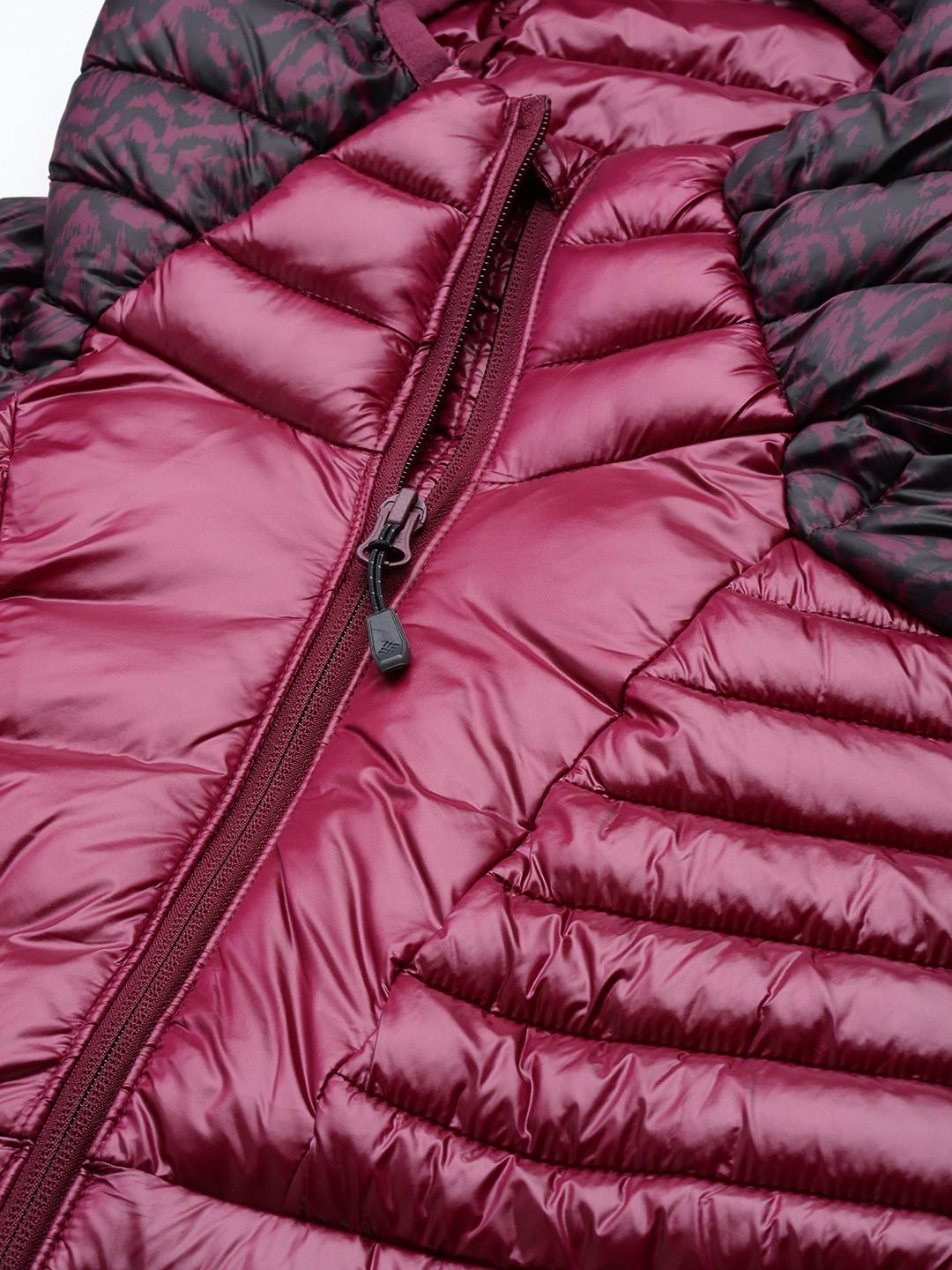 A Women Wearing Columbia Women Purple Labyrinth Loop Hooded Jacket