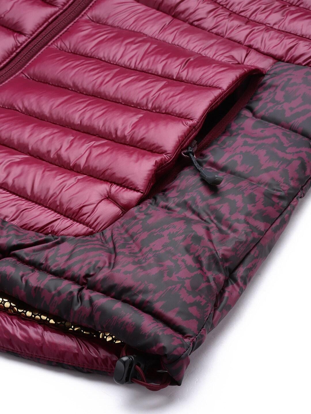 A Women Wearing Columbia Women Purple Labyrinth Loop Hooded Jacket