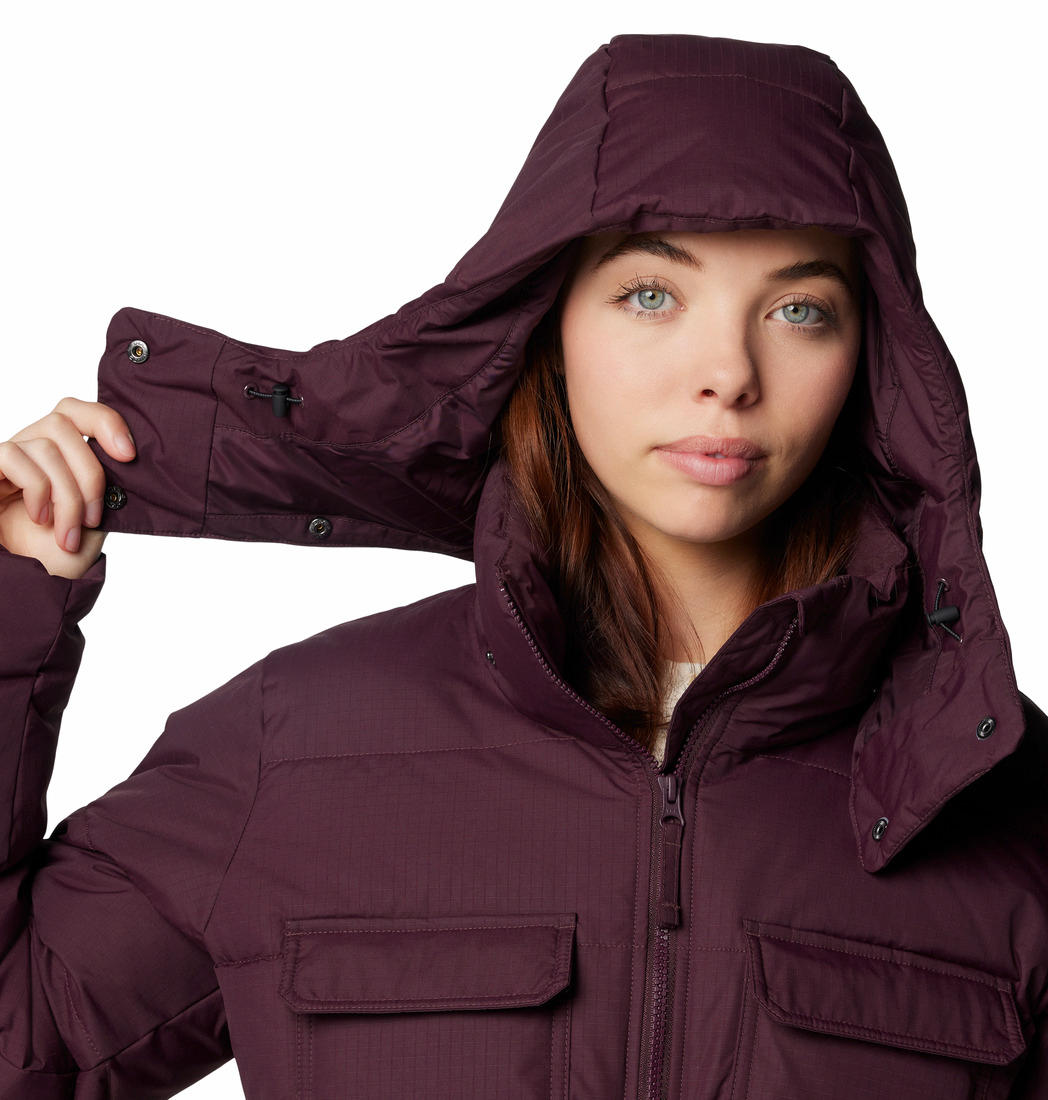 A Women Wearing Columbia Women Red Longhorn Ridge Insulated Jacket