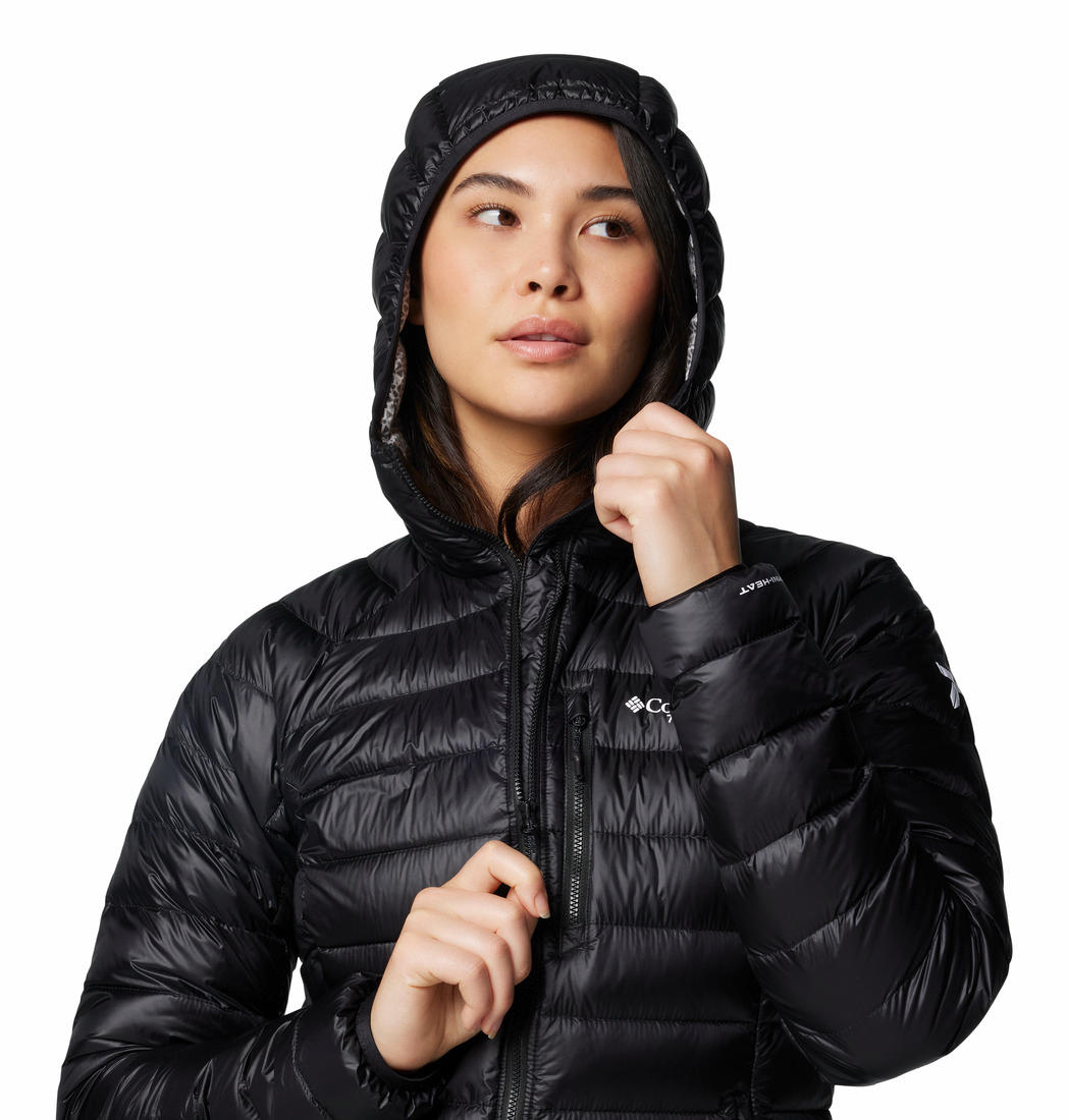 A Women Wearing Columbia Women Black Arctic Crest Down Hooded Jacket