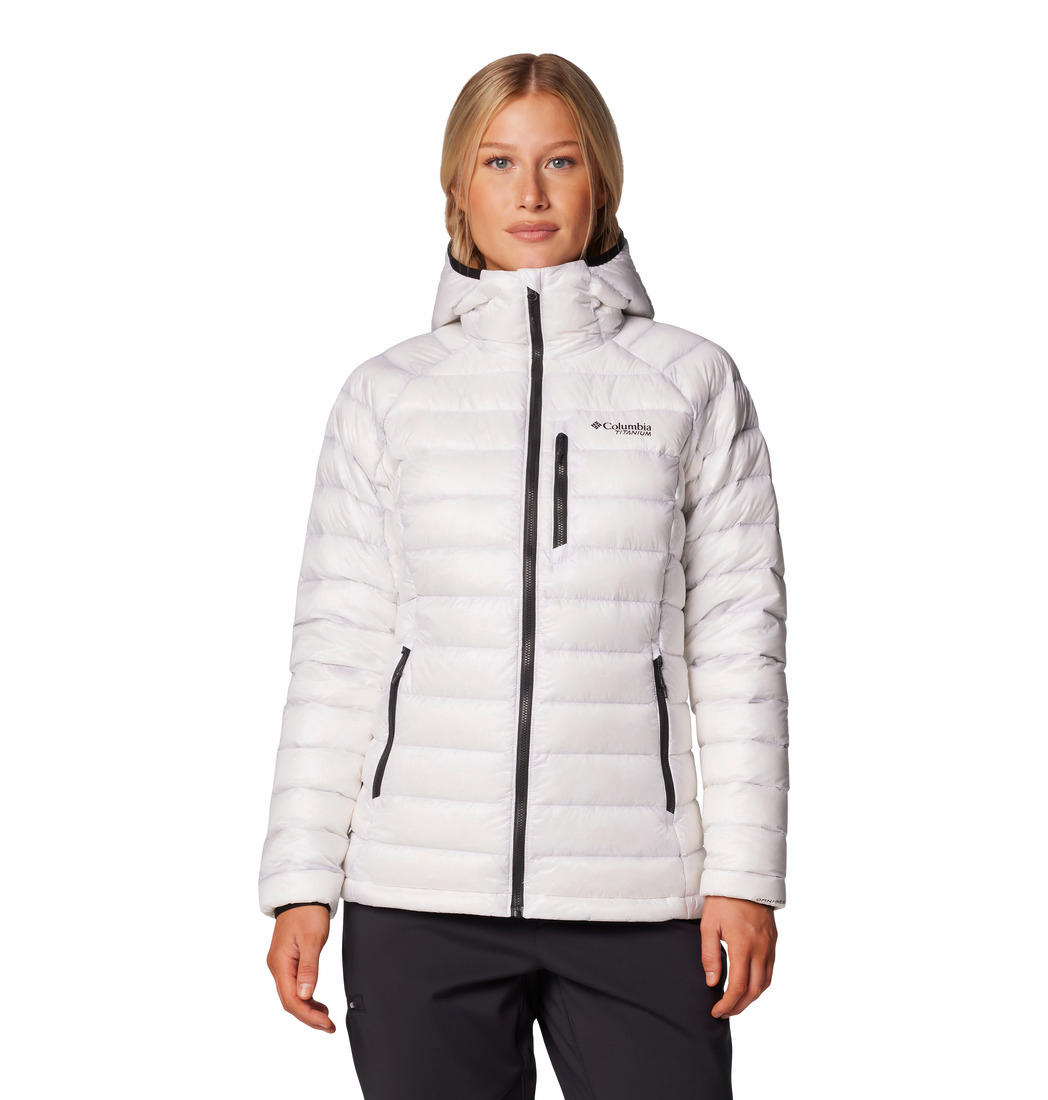 A Women Wearing Columbia Women White Arctic Crest Down Hooded Jacket