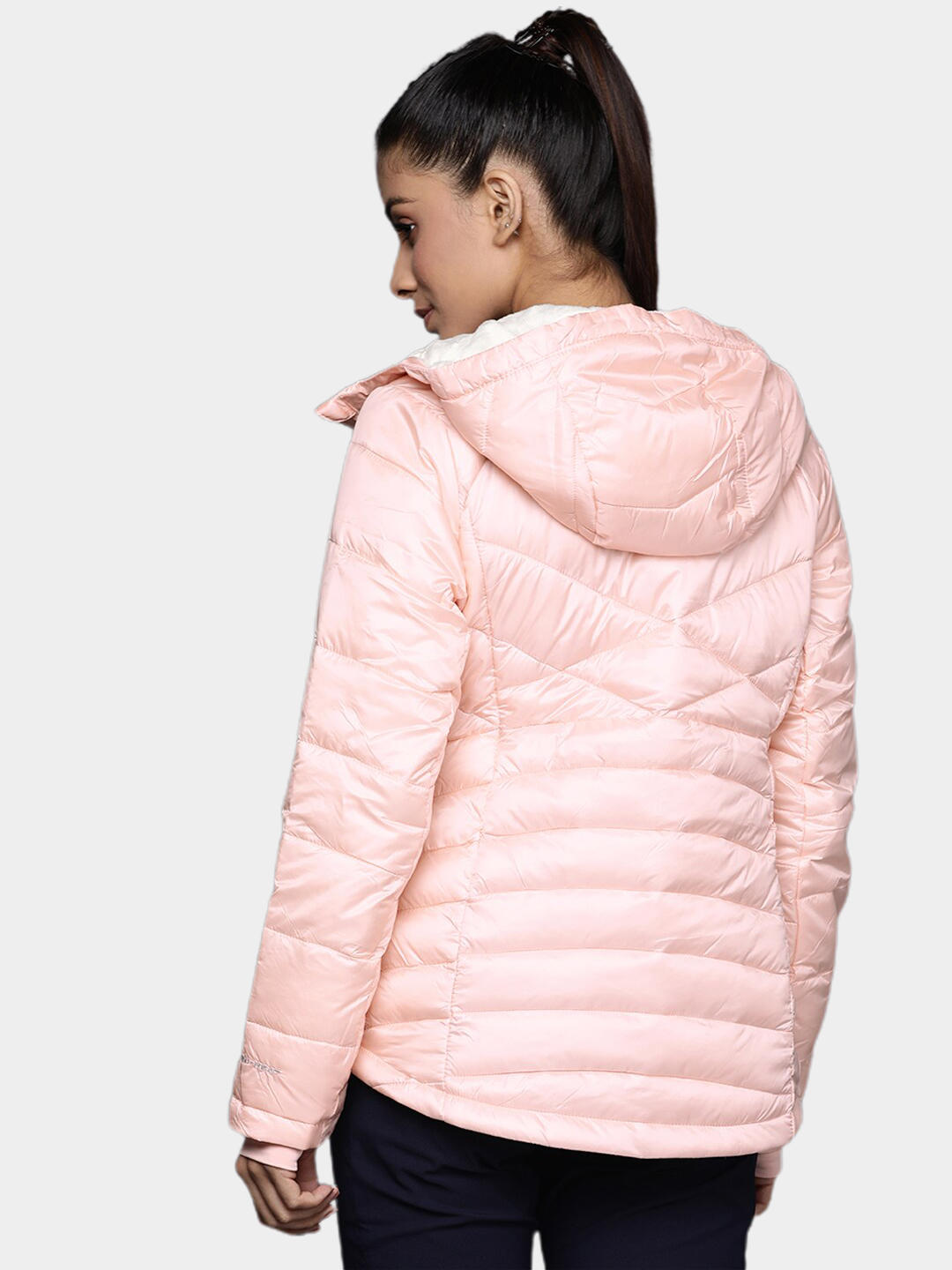 A Women Wearing Columbia Women Peach Joy Peak Hooded Jacket