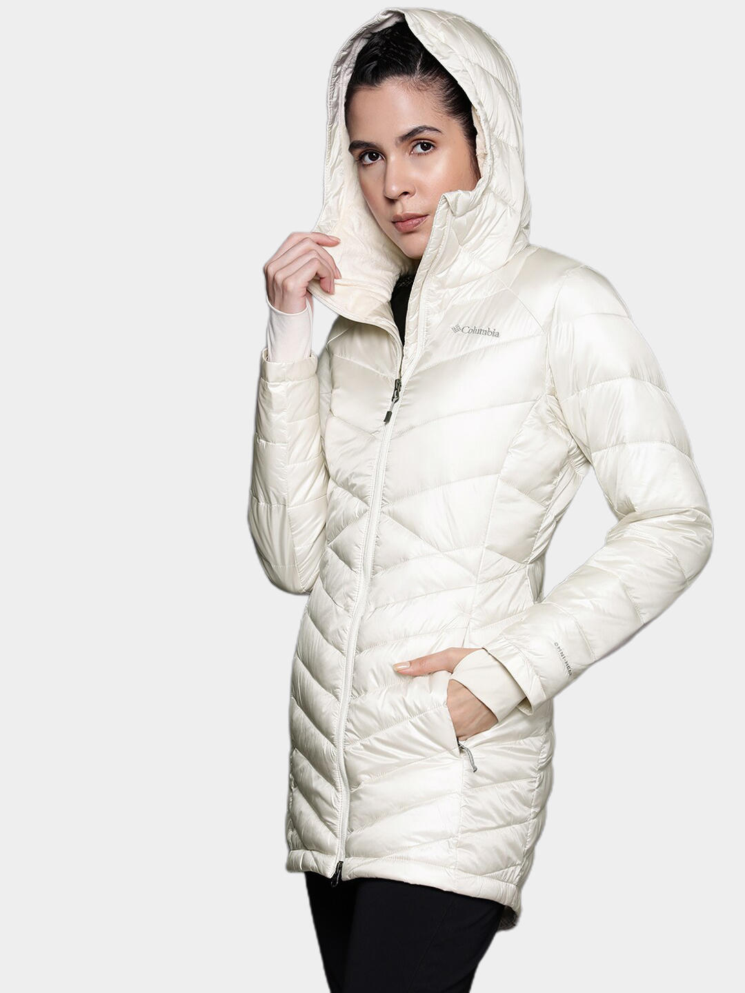 A Women Wearing Columbia Women White Joy Peak Mid Jacket