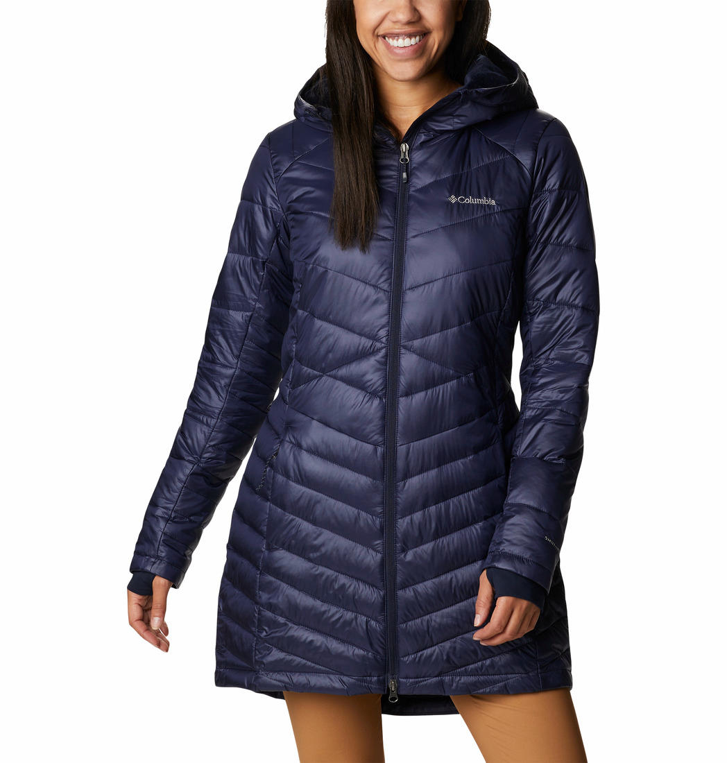 A Women Wearing Columbia Women Navy Blue Joy Peak Mid Jacket