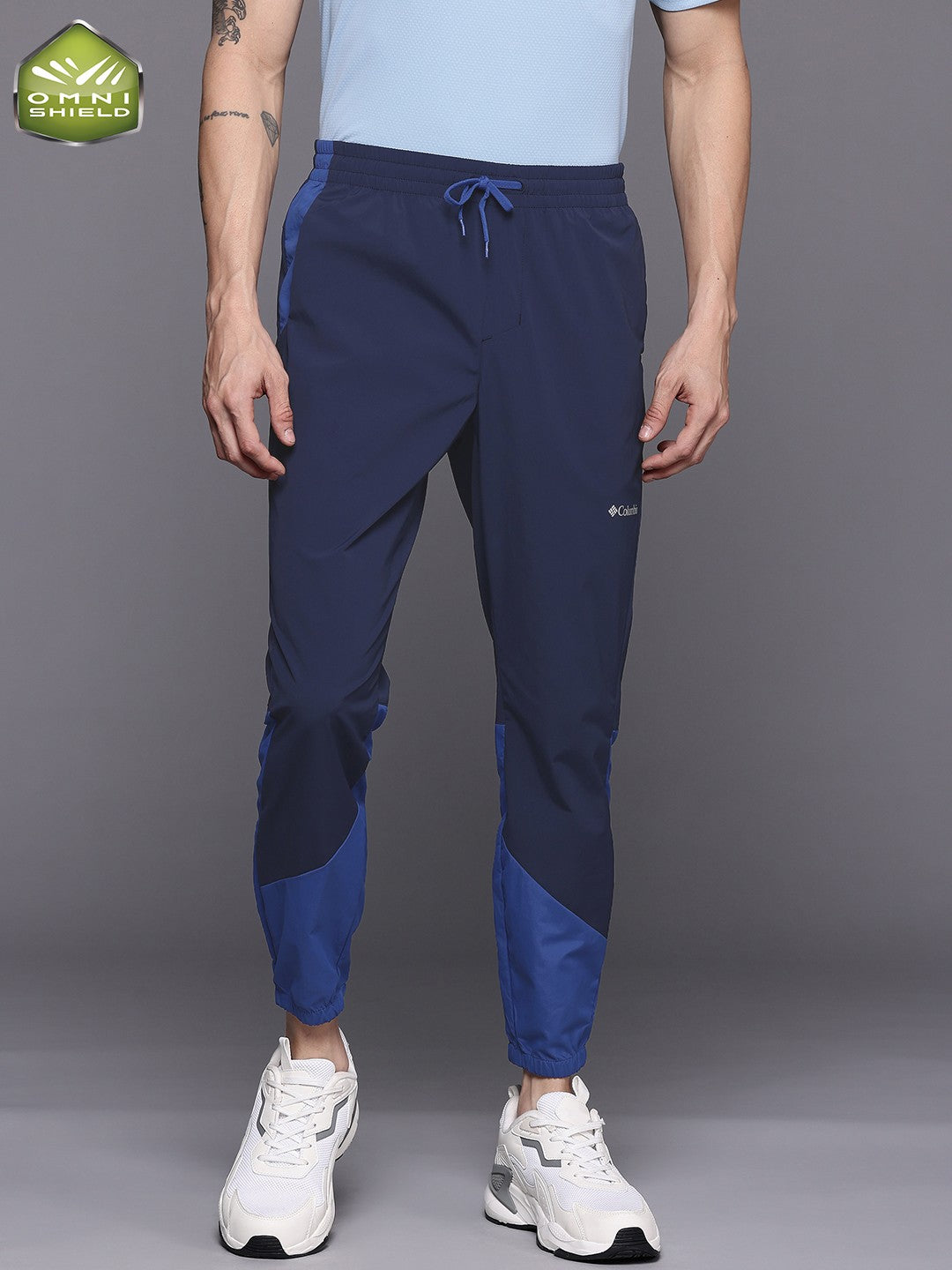 A Men Wearing Columbia Men Blue Columbia Tech Nylon Pant