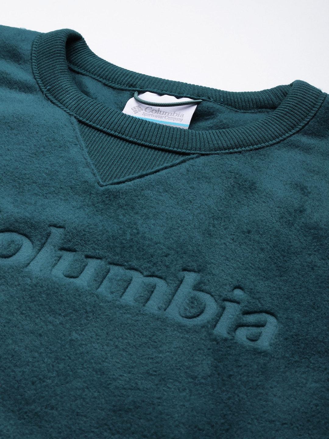 A Men Wearing Columbia Men Blue Steens Mountain Crew 2.0