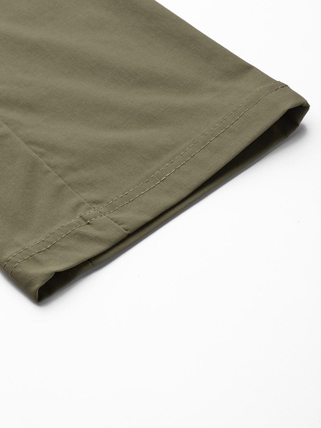 A Women Wearing Columbia Women Green Firwood Core Pant (Sun Protection)