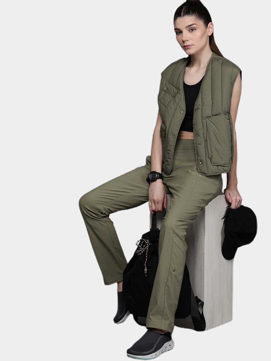 A Women Wearing Columbia Women Green Firwood Core Pant (Sun Protection)