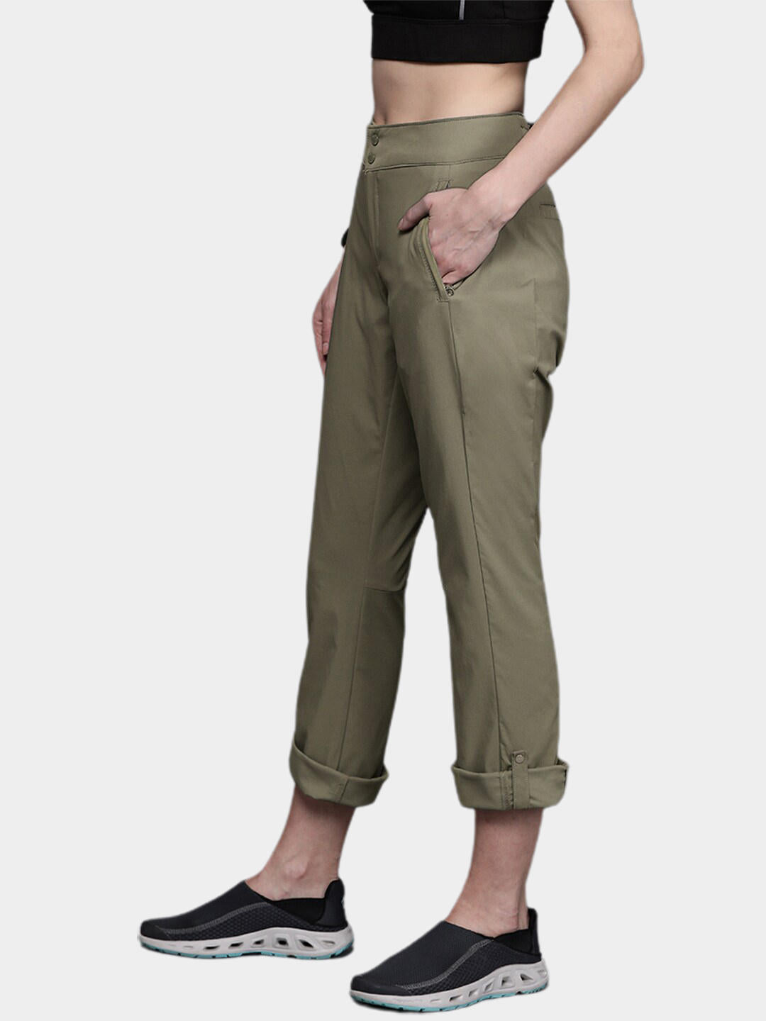 A Women Wearing Columbia Women Green Firwood Core Pant (Sun Protection)