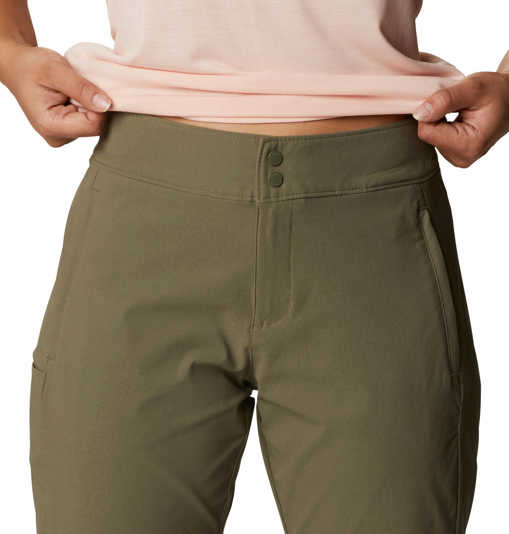 A Women Wearing Columbia Women Green Firwood Core Pant (Sun Protection)