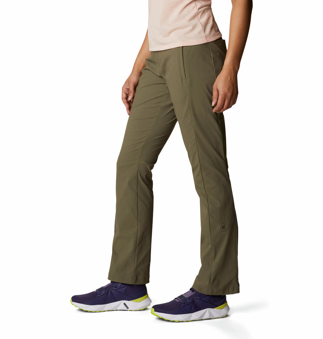 A Women Wearing Columbia Women Green Firwood Core Pant (Sun Protection)