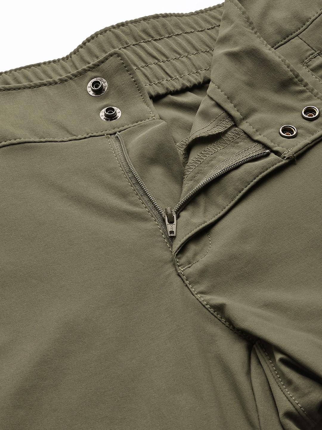 A Women Wearing Columbia Women Green Firwood Core Pant (Sun Protection)